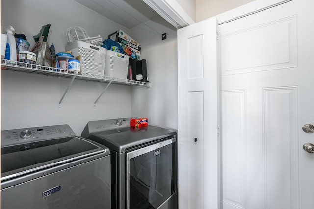 laundry room featuring laundry area and washer and dryer