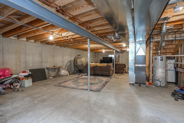 unfinished below grade area with gas water heater and heating unit