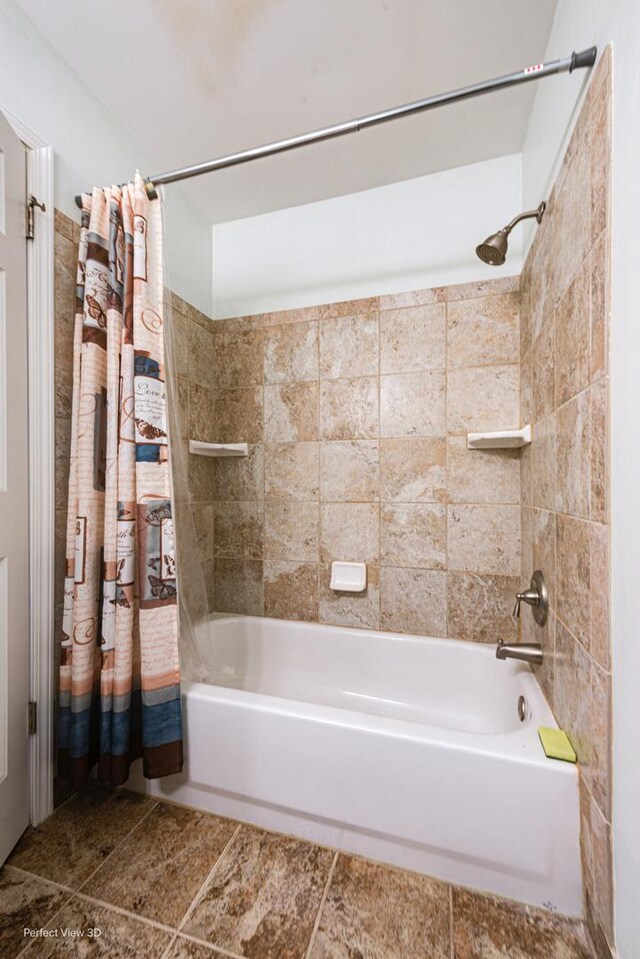 full bathroom featuring shower / tub combo with curtain and tile patterned flooring