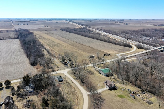 birds eye view of property featuring a rural view