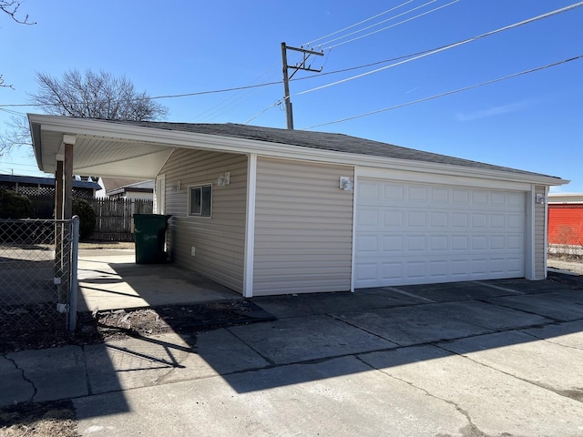 detached garage with fence