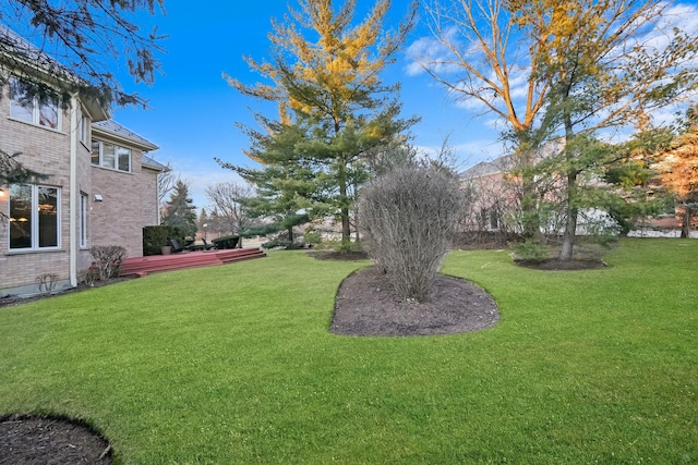 view of yard featuring a deck