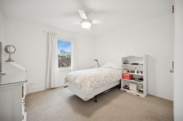 bedroom with baseboards, ceiling fan, and carpet floors