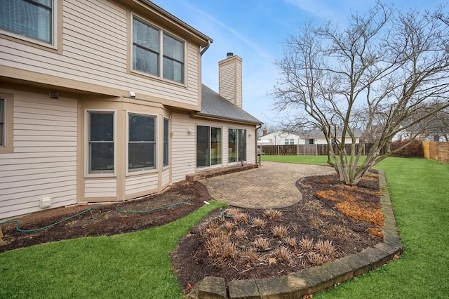 view of yard with a patio area and fence