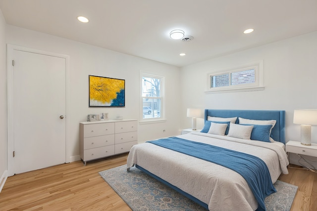 bedroom featuring recessed lighting and light wood finished floors