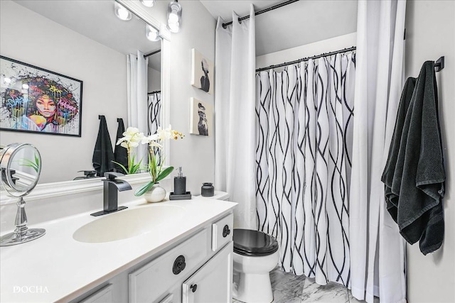 bathroom featuring vanity, a shower with shower curtain, toilet, and marble finish floor