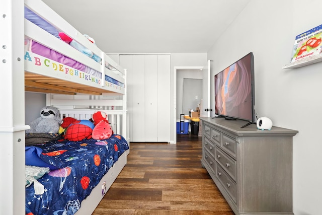 bedroom with wood finished floors