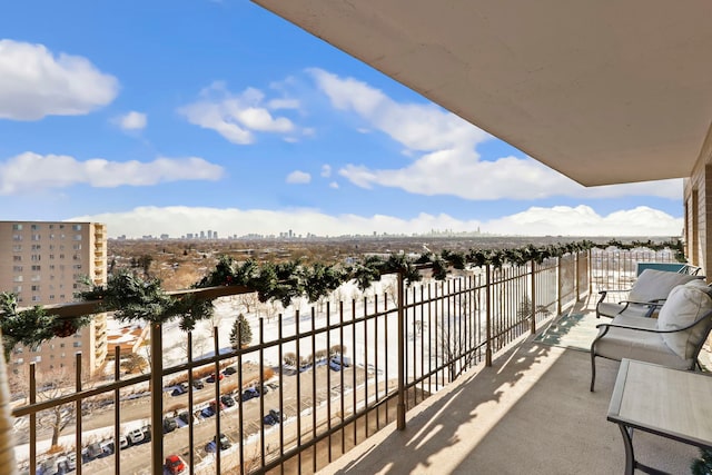 balcony featuring a view of city