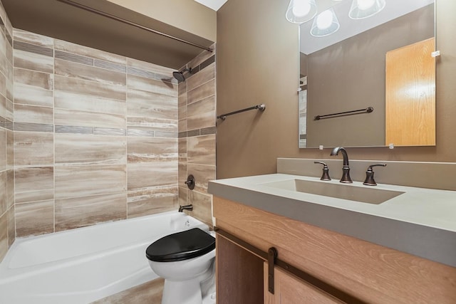 full bathroom with vanity, toilet, and shower / washtub combination