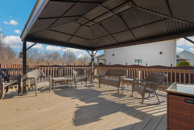 wooden deck with a gazebo