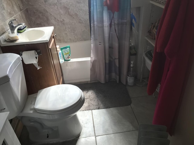 bathroom featuring toilet, shower / tub combo with curtain, tasteful backsplash, tile patterned flooring, and vanity