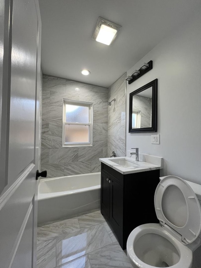 full bath featuring toilet, recessed lighting, bathing tub / shower combination, marble finish floor, and vanity