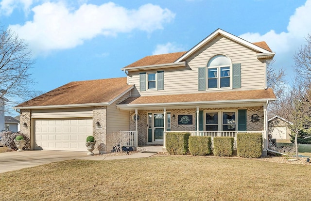 traditional-style home with a front yard, driveway, an attached garage, covered porch, and brick siding