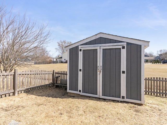 view of shed featuring a fenced backyard