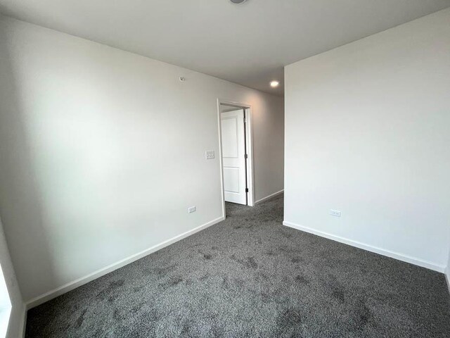 bedroom with access to exterior, carpet flooring, and baseboards