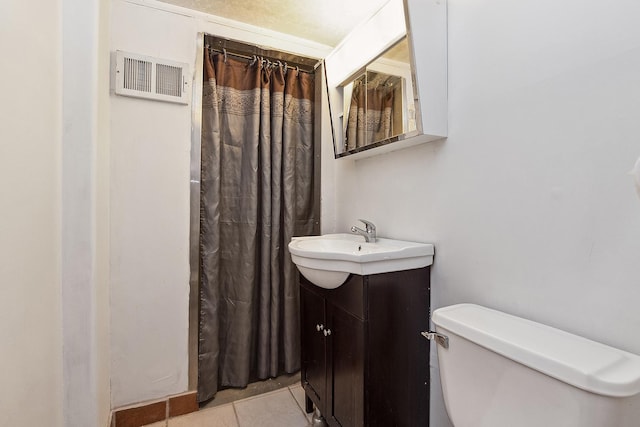 bathroom featuring tile patterned floors, visible vents, toilet, a shower with curtain, and vanity