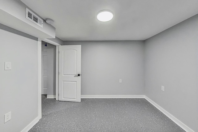 spare room with visible vents and baseboards