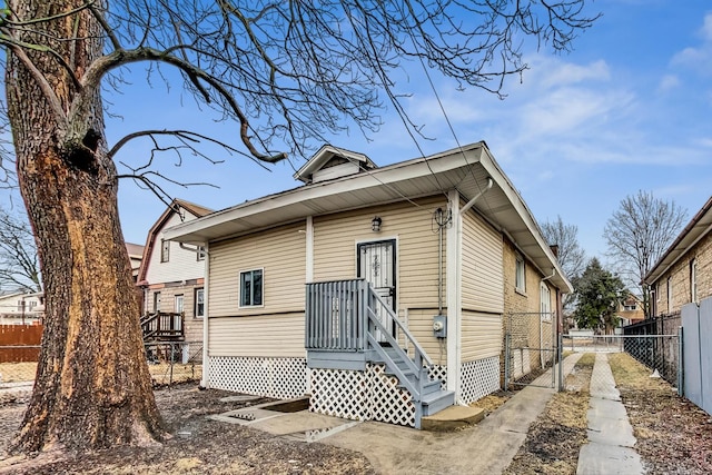 view of front facade with a gate and fence