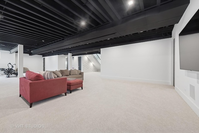 interior space featuring carpet flooring and stairway