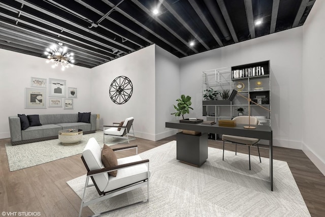 office area with wood finished floors and baseboards