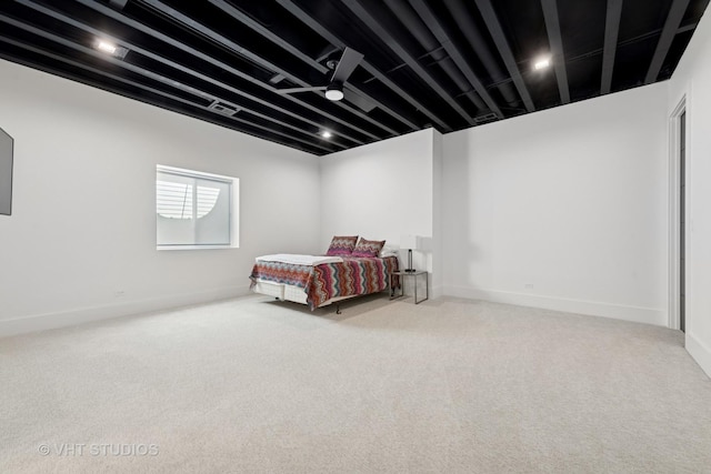 carpeted bedroom with baseboards