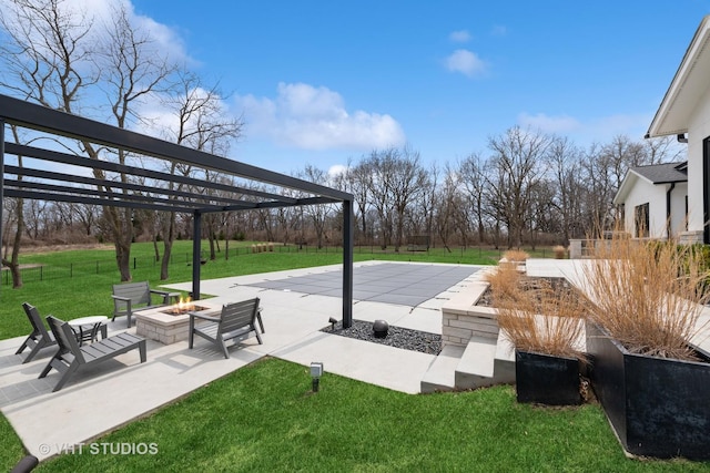 view of patio / terrace with an outdoor fire pit, a pergola, and fence