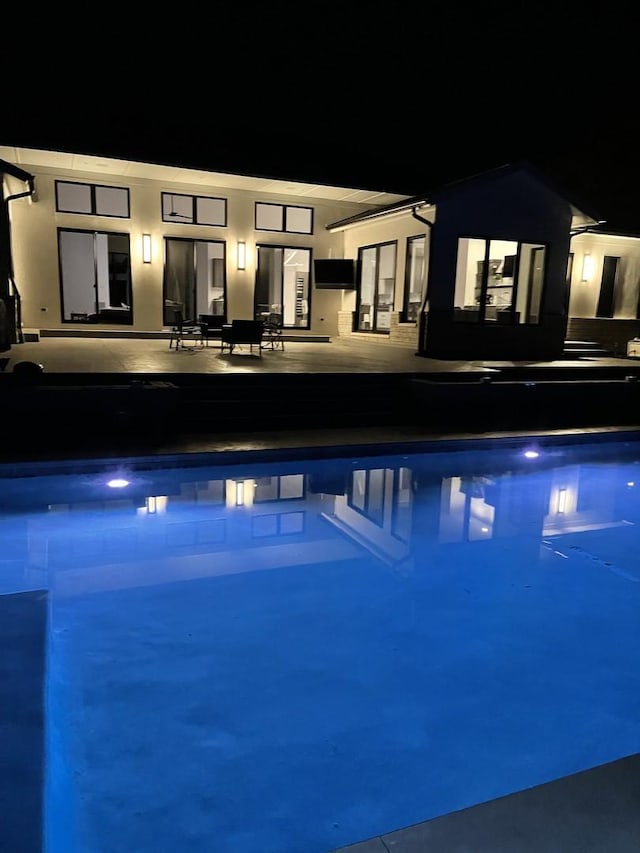 outdoor pool featuring a patio area
