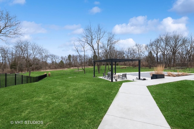 surrounding community featuring a patio area, fence, and a lawn