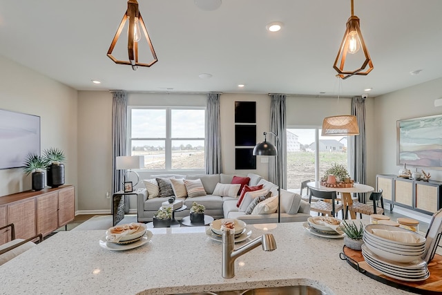 living area with recessed lighting