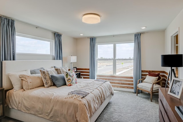 carpeted bedroom with recessed lighting