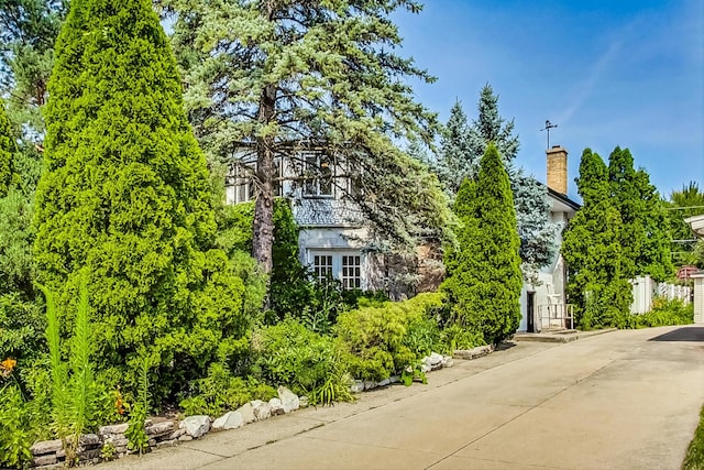 exterior space featuring a chimney