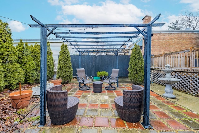 view of patio with fence private yard and a pergola