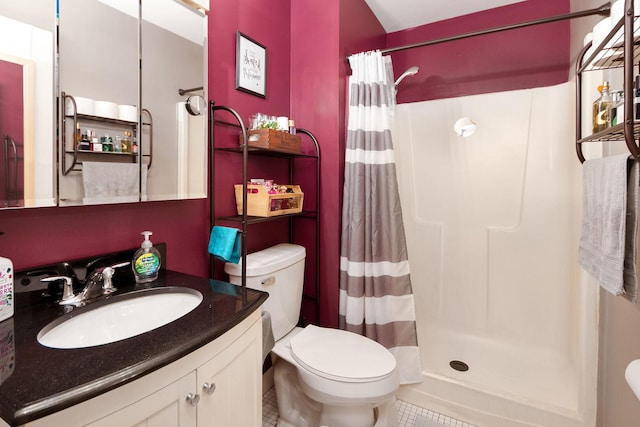 full bathroom with tile patterned flooring, a shower with curtain, vanity, and toilet