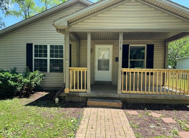 1312 N Hickory St, Champaign, IL 61820 - view of front facade featuring covered porch