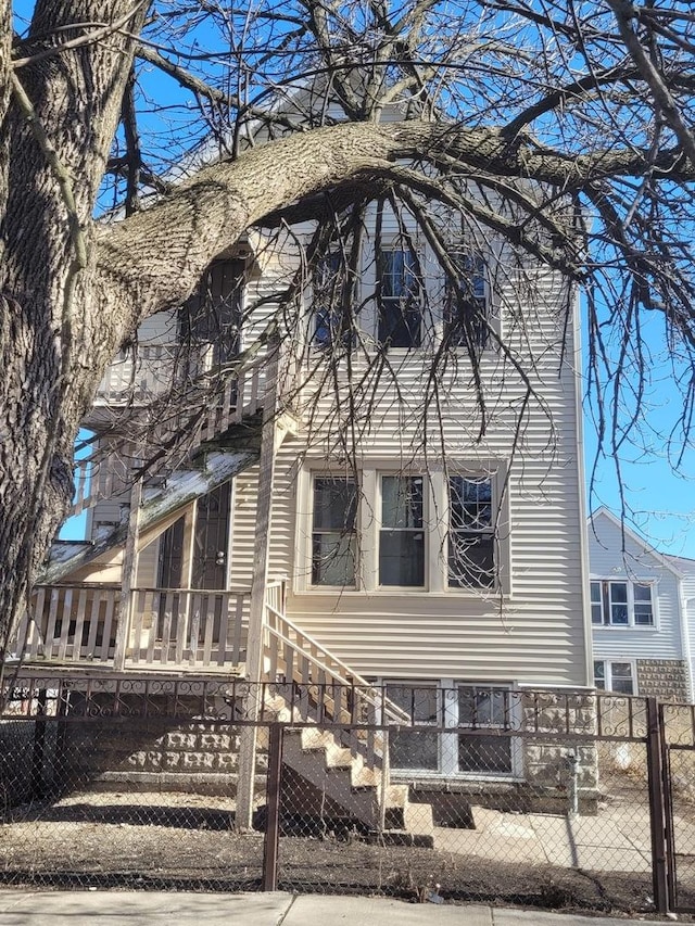 view of side of property with a fenced front yard