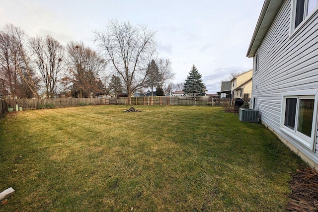 view of yard featuring cooling unit and a fenced backyard