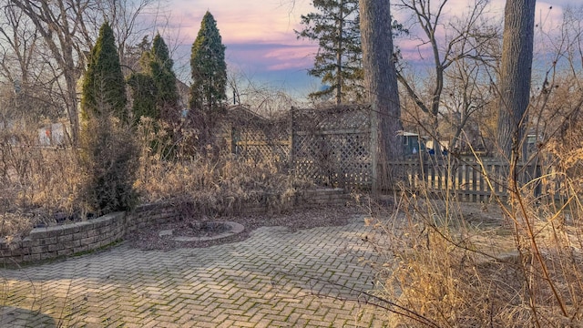 view of yard featuring a patio and fence