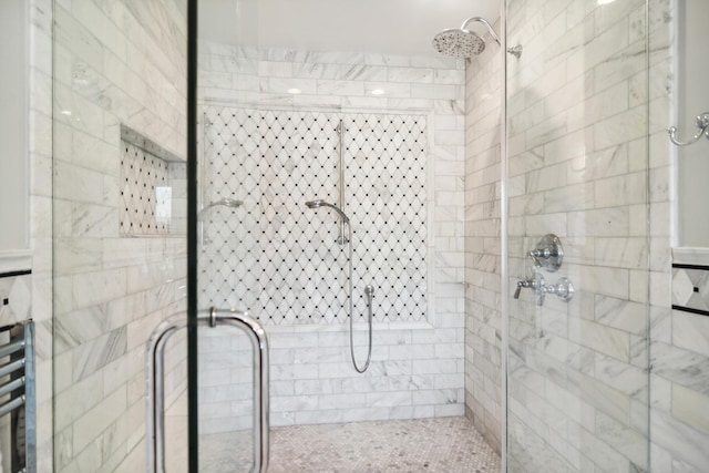 full bath featuring a stall shower and radiator heating unit