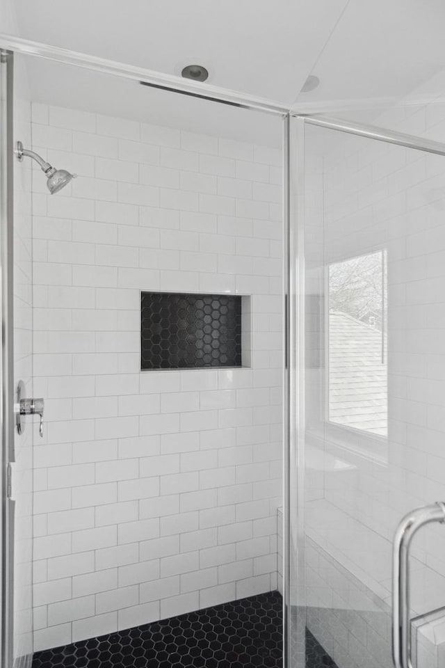 bathroom featuring a stall shower