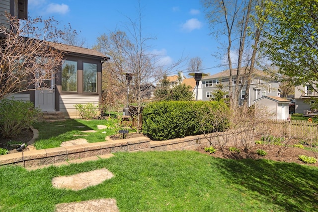 view of yard with entry steps