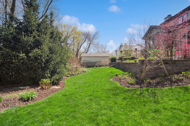 view of yard with fence