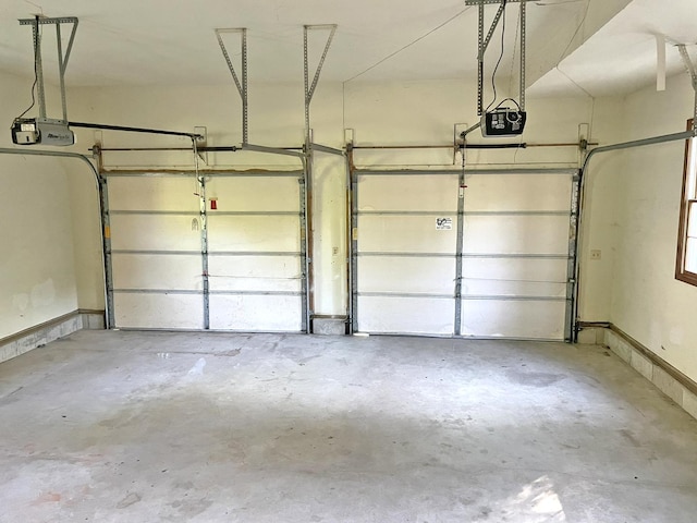 garage featuring a garage door opener