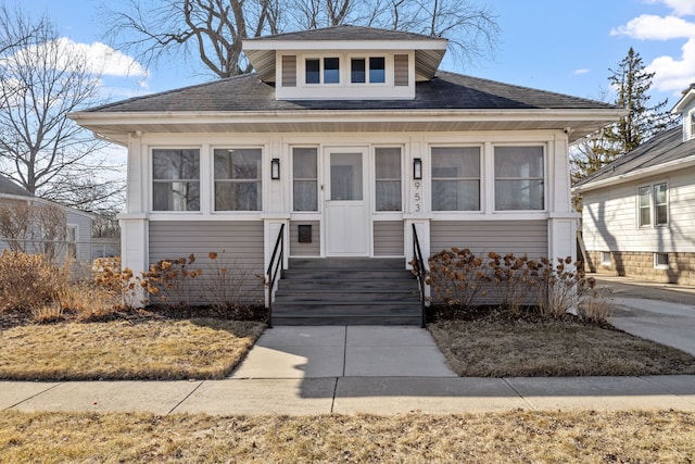 bungalow-style home featuring entry steps