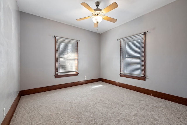 unfurnished bedroom with visible vents, a closet, carpet, baseboards, and a spacious closet