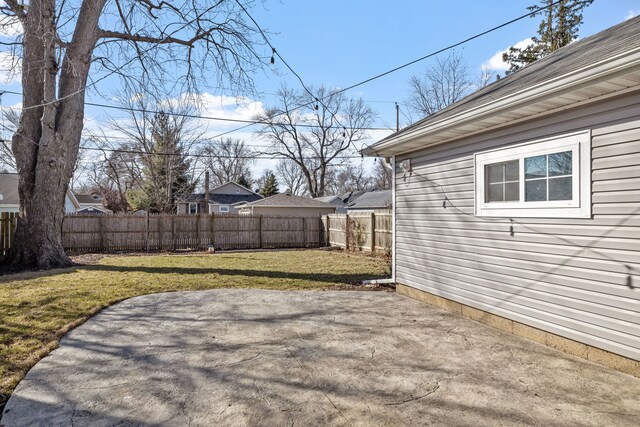 view of yard featuring a patio and a fenced backyard