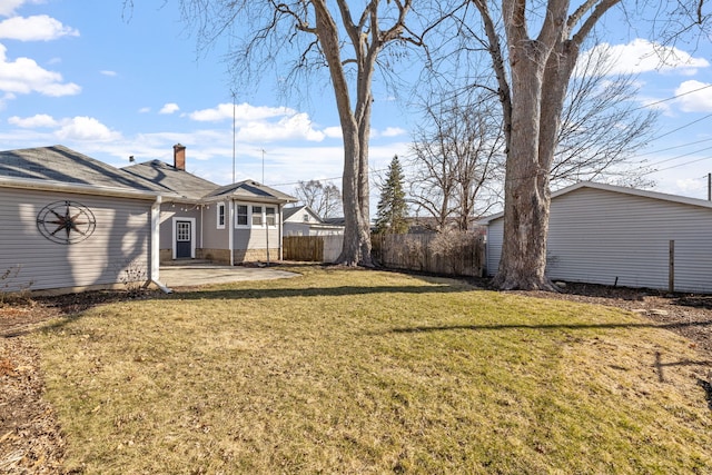 view of yard with a patio area and fence