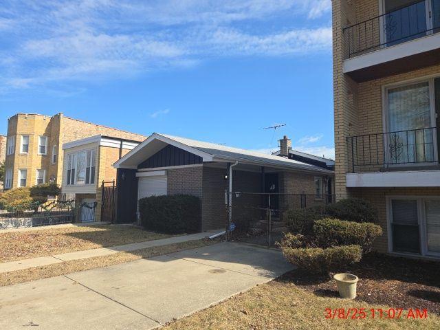 view of front of property with brick siding