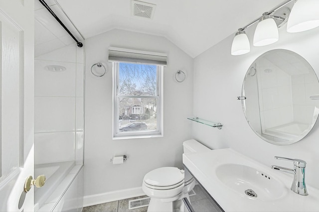 bathroom featuring visible vents, baseboards, toilet, vaulted ceiling, and a sink