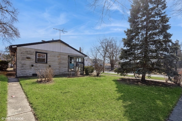 view of property exterior featuring stone siding, a lawn, and cooling unit