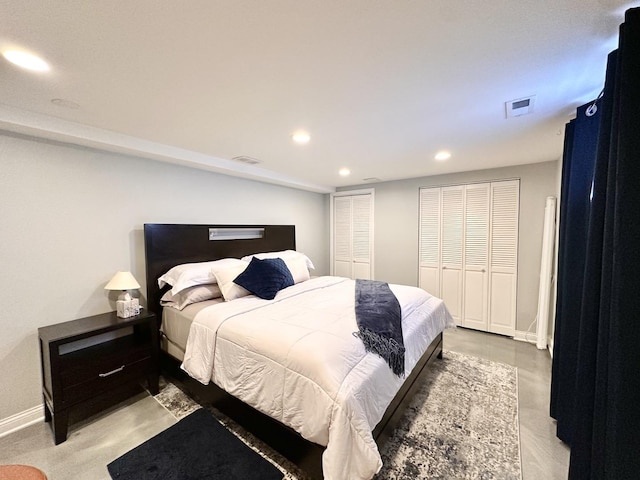 bedroom with recessed lighting, visible vents, and baseboards